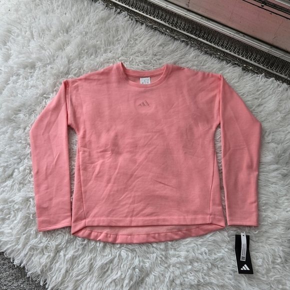 adidas Girls' Embroidered Training Lightweight Long Sleeve Pullover. Semi Pink. - Picture 1 of 8